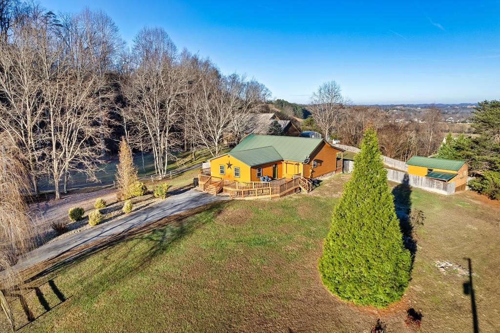 aerial view of a house with a swimming pool