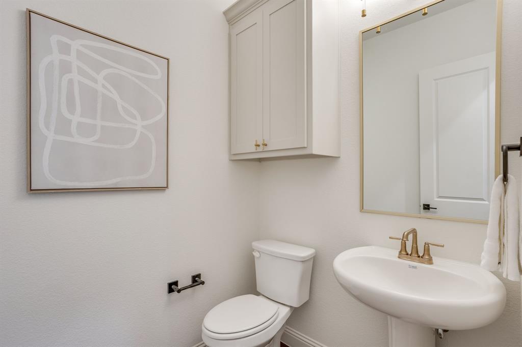 608 Tay Tay Way Springtown, TX 76082 - Photo 28 of 40 Powder bath with custom cabinetry.