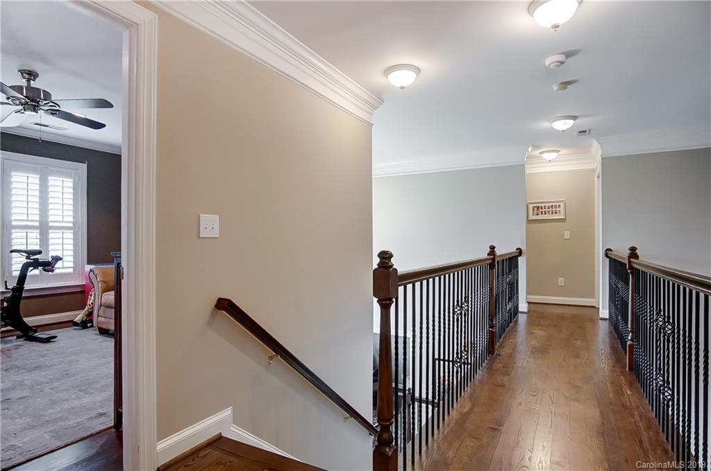 18408 Dembridge Drive, Unit 21 Davidson, NC 28036 - Photo 23 of 34 a view of a hallway view with staircase