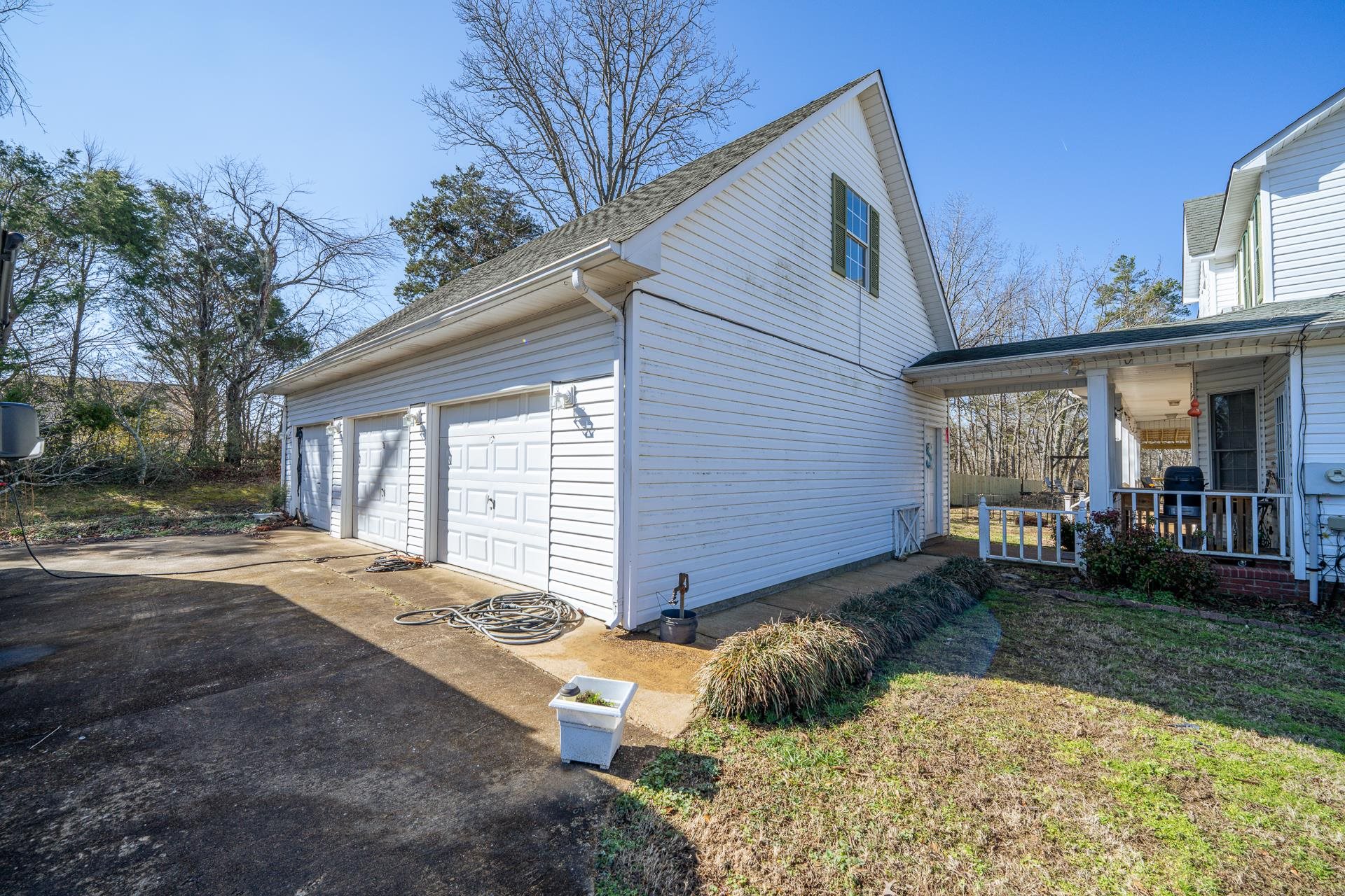 645 Wildflower Ridge Lane Savannah, TN 38372 - Photo 15 of 40 a view of a house with backyard and sitting area