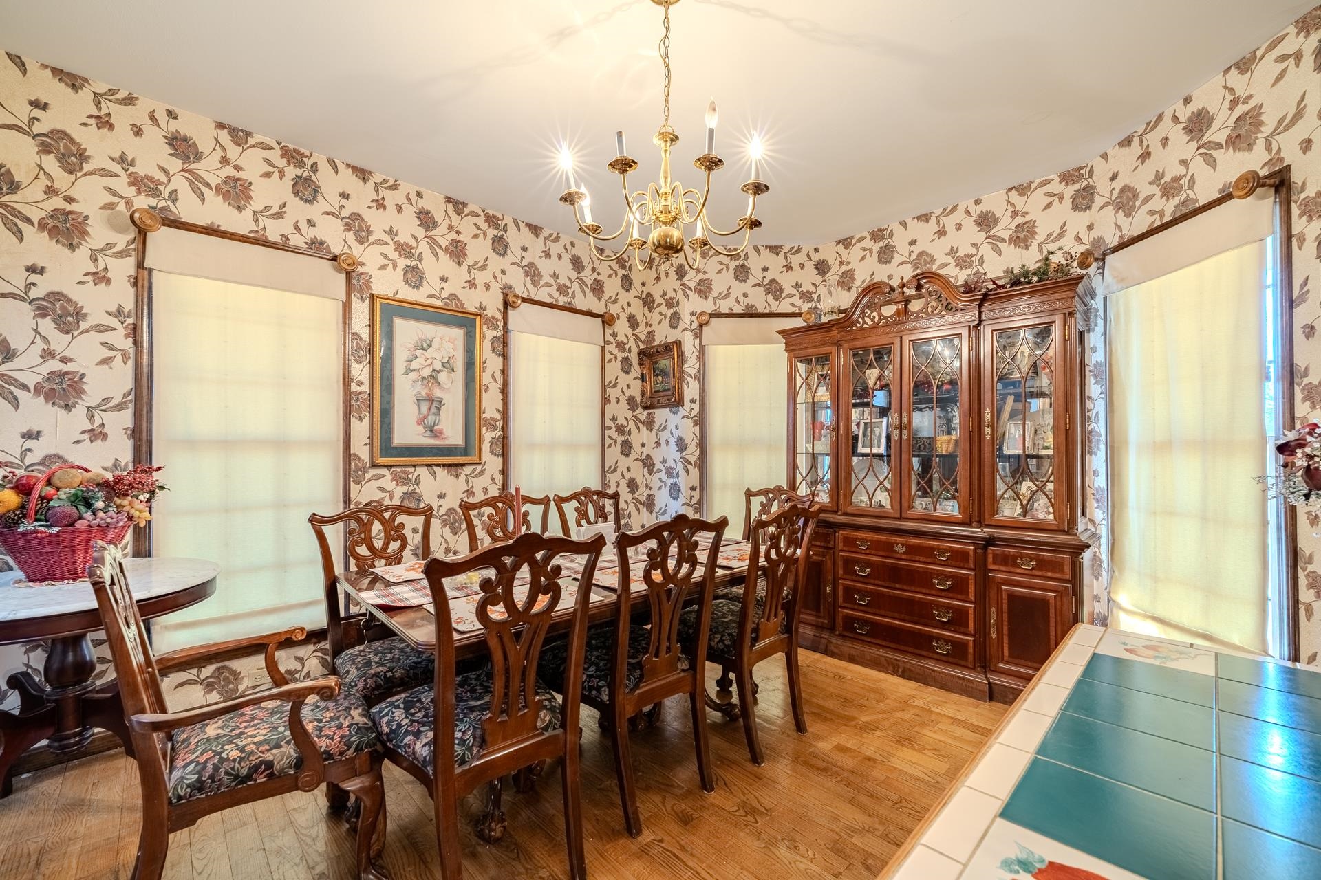 645 Wildflower Ridge Lane Savannah, TN 38372 - Photo 26 of 40 a view of a dining room with furniture and chandelier