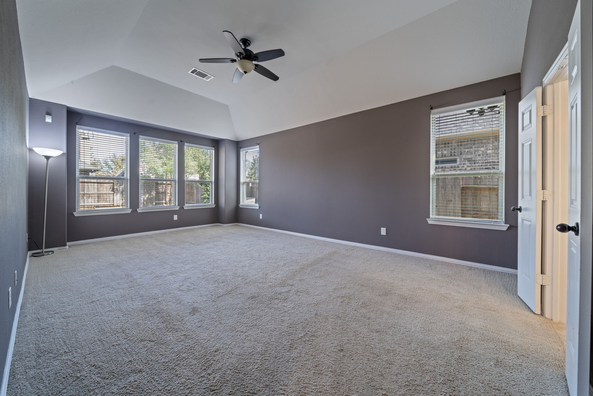 8115 Spreadwing Street Conroe, TX 77385 - Photo 25 of 45 a view of an empty room with a window