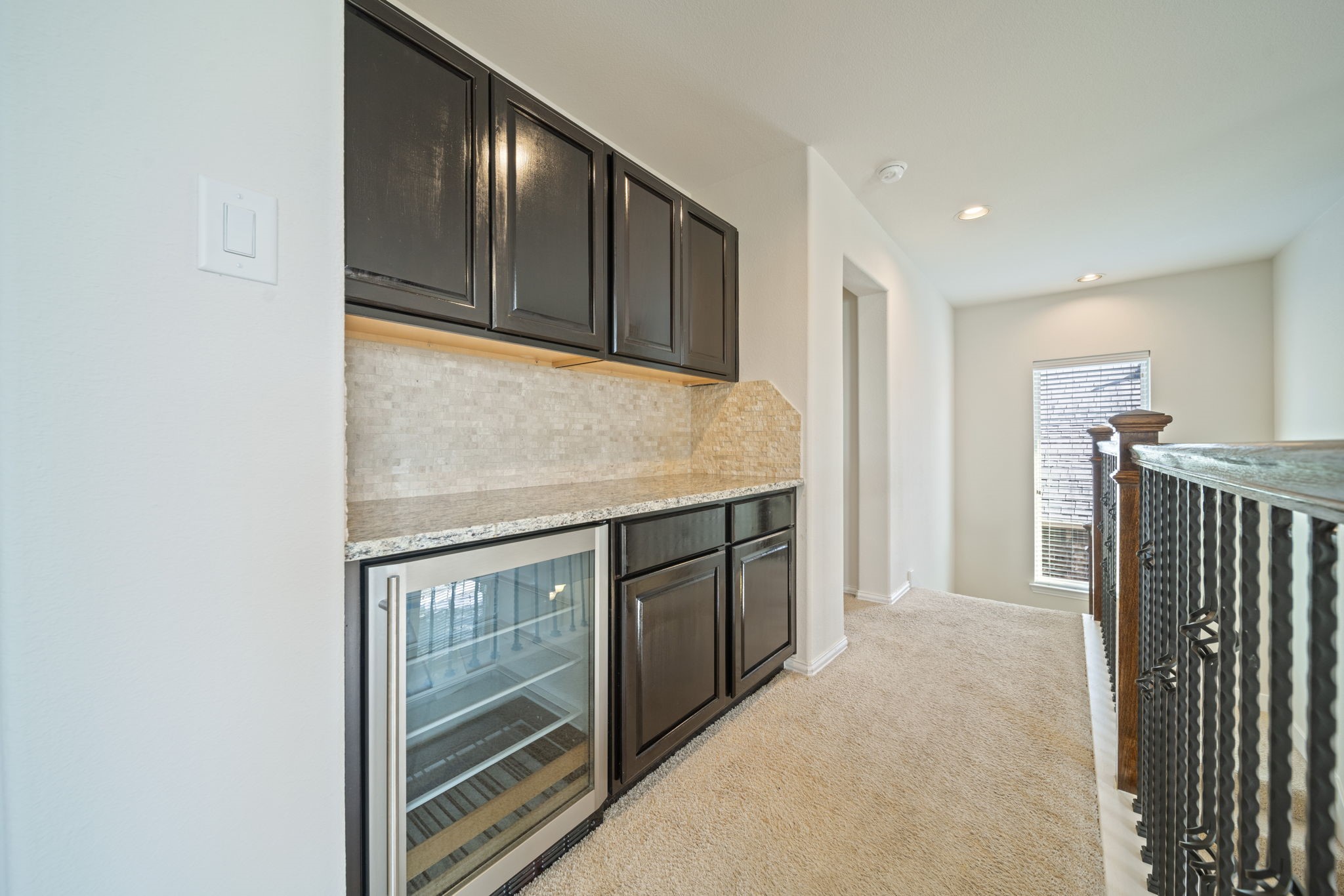 8115 Spreadwing Street Conroe, TX 77385 - Photo 31 of 45 a view of hallway with elevator