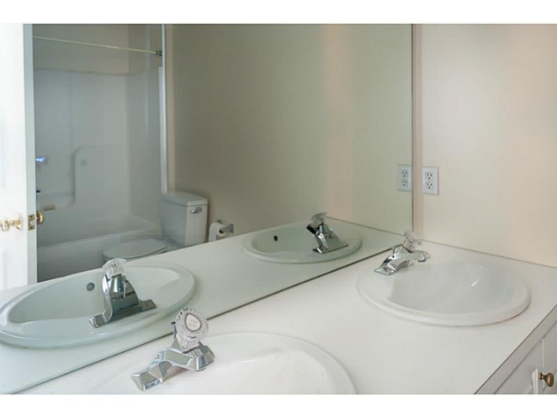434 Sleepy Hollow Farm Road Warwick, RI 02886 - Photo 15 of 24 Master Bath/Spa. The master bathroom has double sinks and a tub/shower combination.