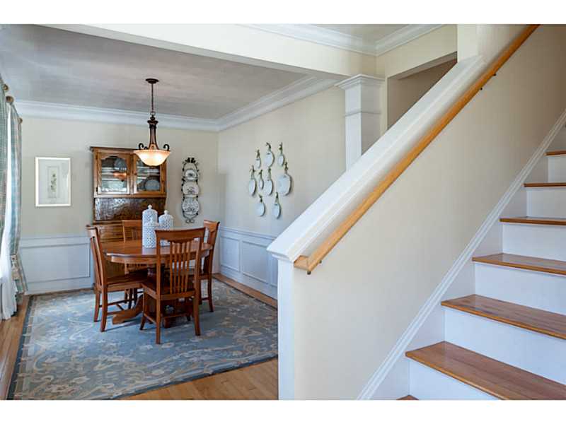 Dining Room. This center hall Colonial offers a formal dining room to the left and a formal living room to the right. The hardwood floors are in beautiful condition!