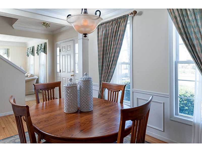 Dining Room. Another view from the dining room looking toward the front door and the living room beyond.