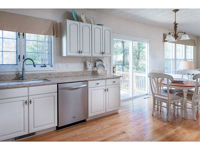 Kitchen. The glass sliders to the back deck offer lots of natural light.