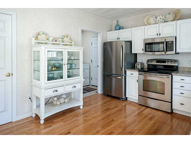 Kitchen. The first floor laundry is conveniently located right off of the kitchen. Close the door and it s out of sight! No need to haul your laundry to the basement.