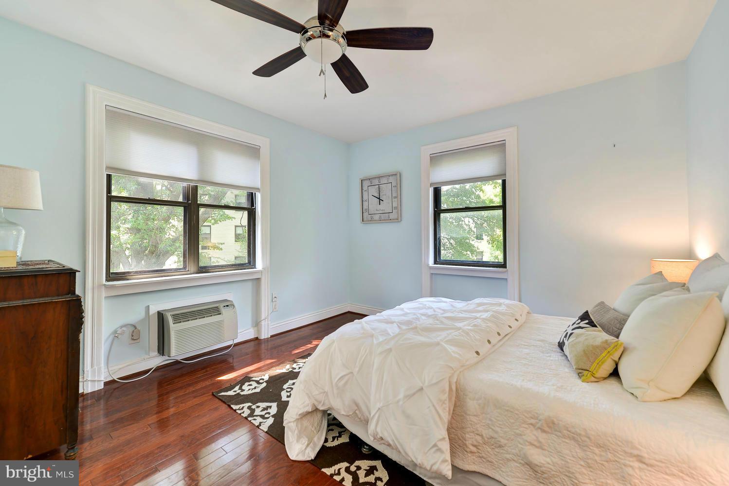 3100 Connecticut Avenue Northwest, Unit 304 Washington, DC 20008 - Photo 9 of 15 a bedroom with a bed and a window