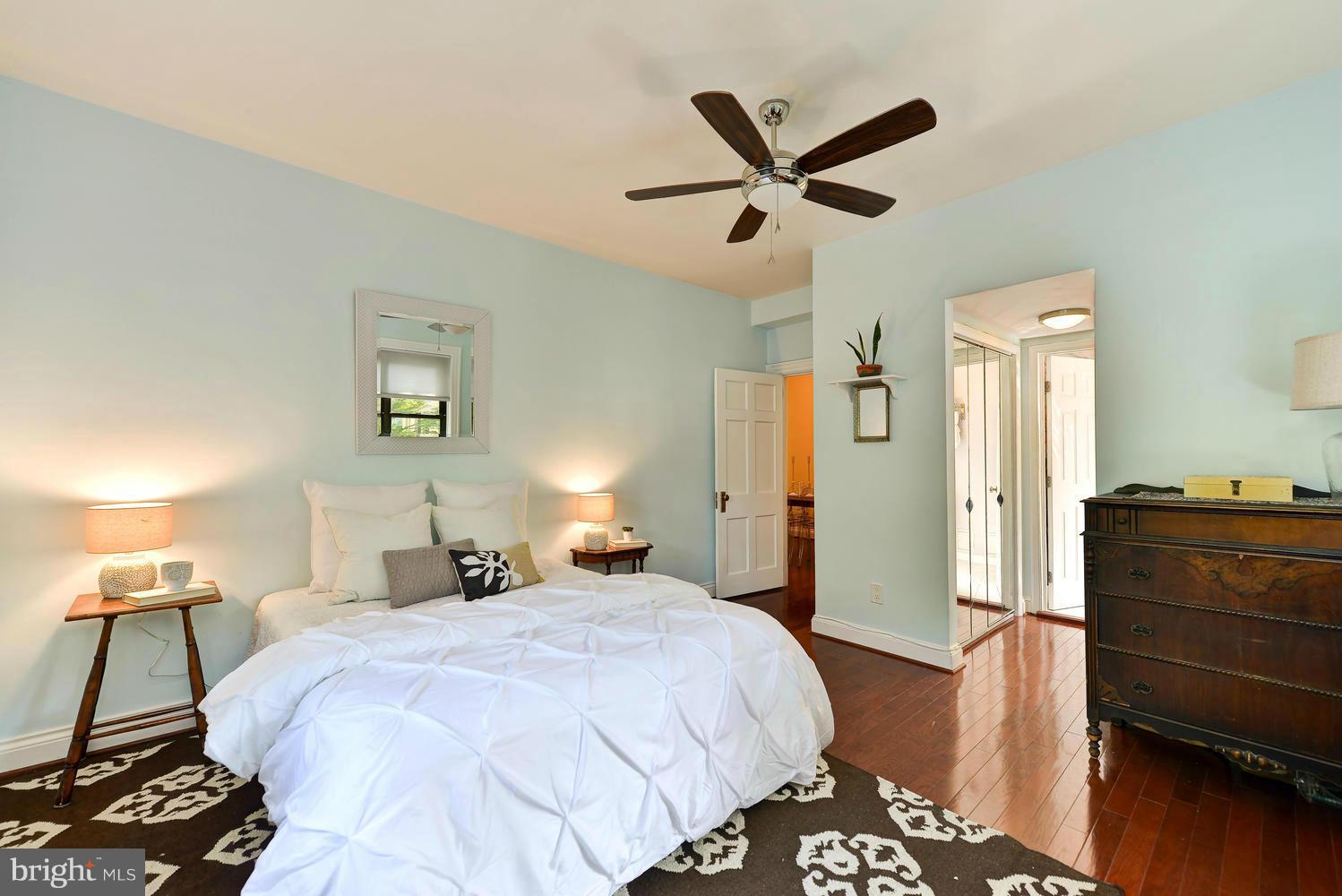 3100 Connecticut Avenue Northwest, Unit 304 Washington, DC 20008 - Photo 10 of 15 a bedroom with a bed and a dresser