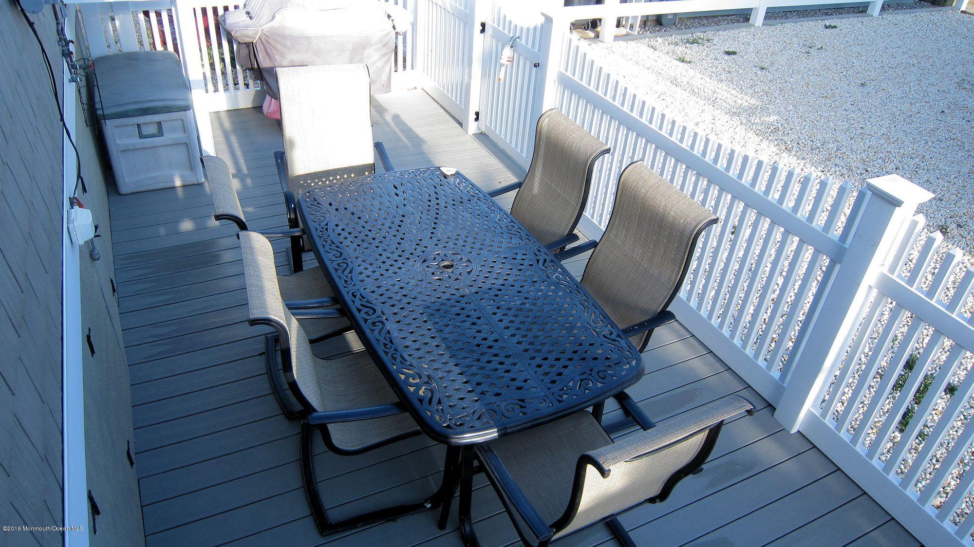 104 West Plover Way Lavallette, NJ 08735 - Photo 11 of 12 a view of entryway with wooden floor