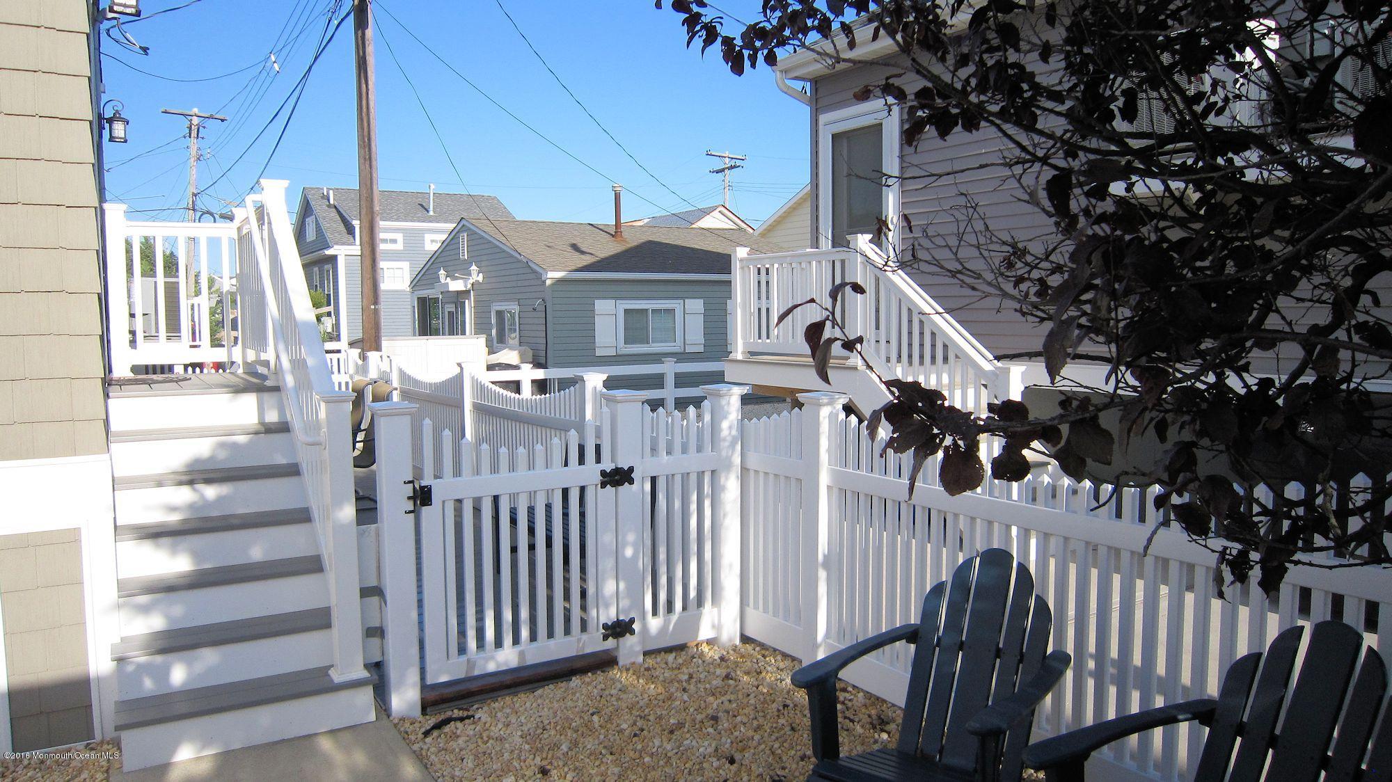 104 West Plover Way Lavallette, NJ 08735 - Photo 12 of 12 a view of a house with a porch