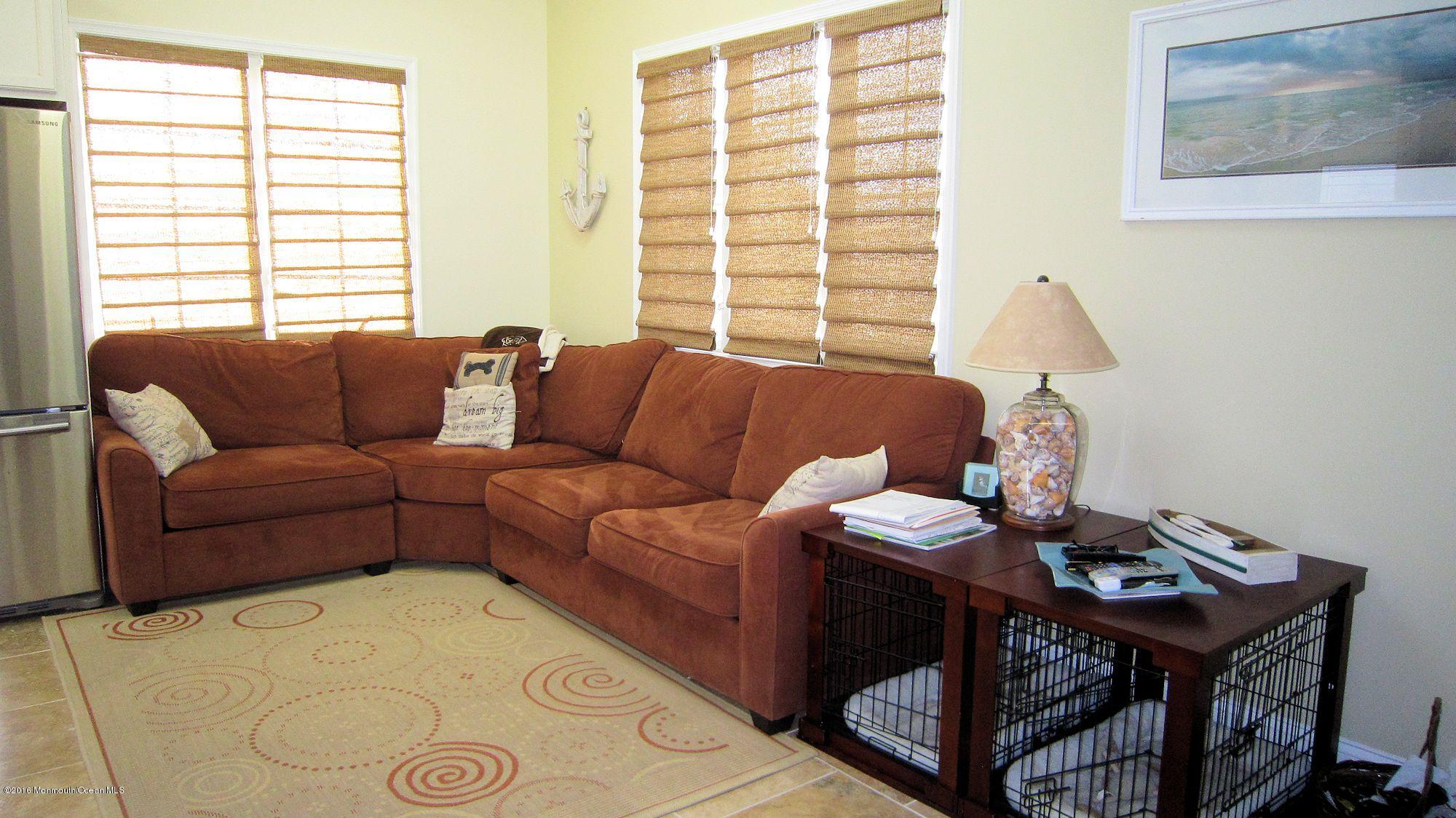 104 West Plover Way Lavallette, NJ 08735 - Photo 2 of 12 a living room with furniture and a window