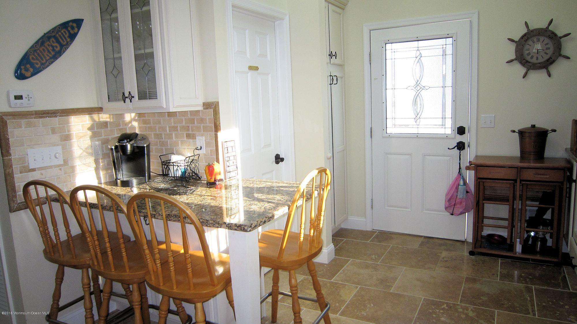 104 West Plover Way Lavallette, NJ 08735 - Photo 6 of 12 a dining room with furniture and window
