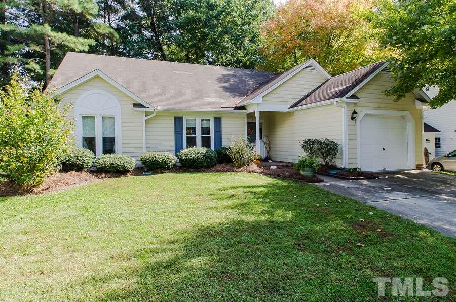 5521 Edgebury Road Raleigh, NC 27613 - Photo 2 of 19 a view of a house with backyard and garden