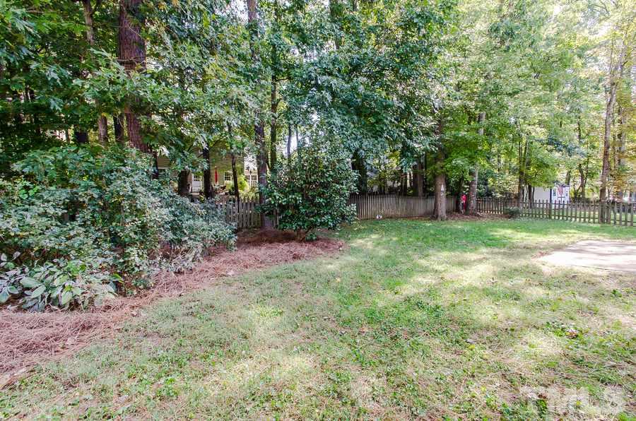5521 Edgebury Road Raleigh, NC 27613 - Photo 18 of 19 a view of a park with large trees