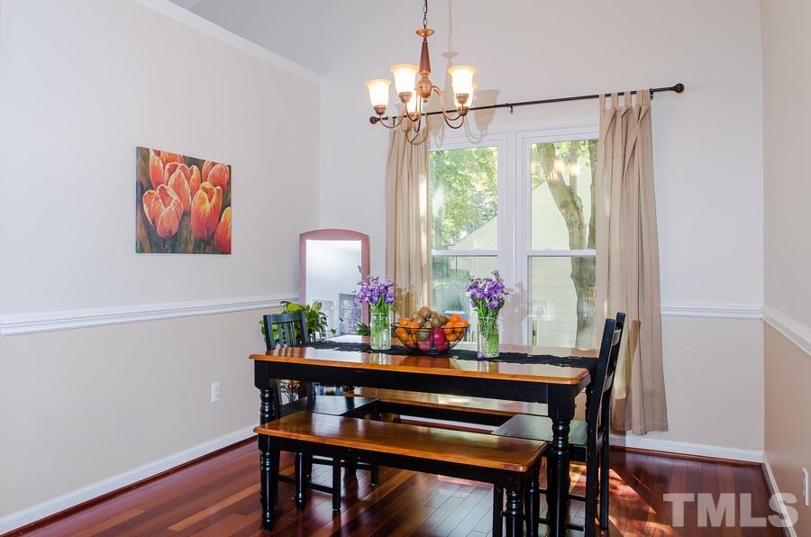 5521 Edgebury Road Raleigh, NC 27613 - Photo 4 of 19 a view of a dining room with furniture window and outside view