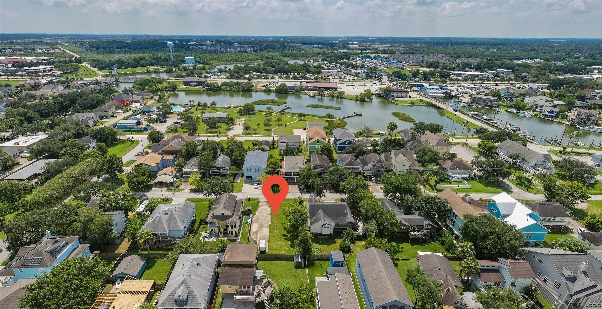 822 Cedar Road Clear Lake Shores, TX 77565 - Photo 2 of 20 an aerial view of residential houses with outdoor space