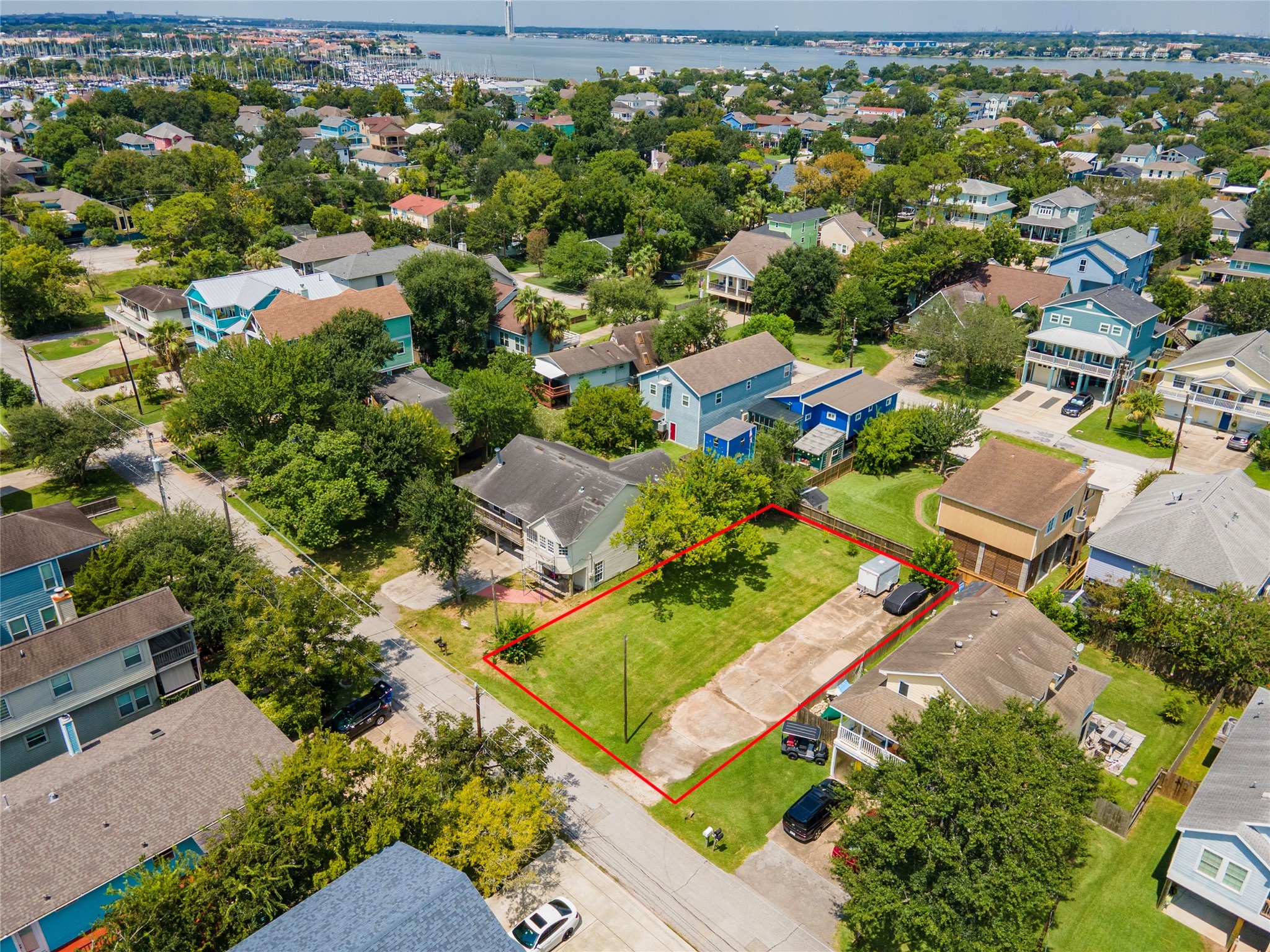 822 Cedar Road Clear Lake Shores, TX 77565 - Photo 6 of 20 an aerial view of residential houses with outdoor space