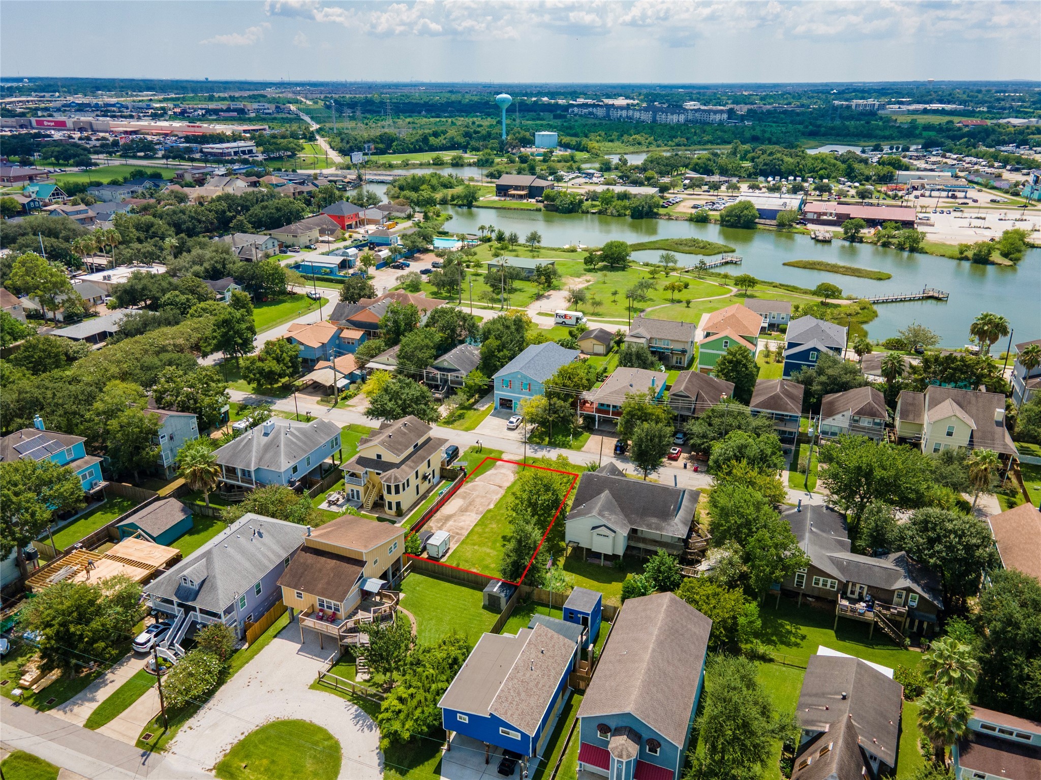822 Cedar Road Clear Lake Shores, TX 77565 - Photo 7 of 20 an aerial view of residential houses with outdoor space