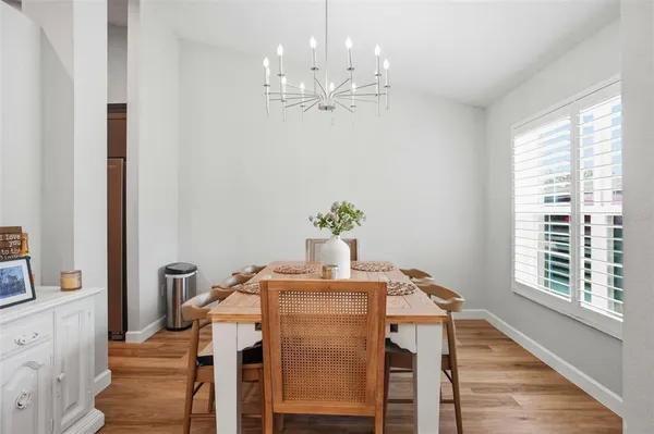 a workspace with furniture and a window