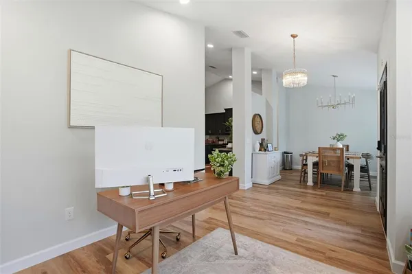 a bedroom with a bed and cabinet
