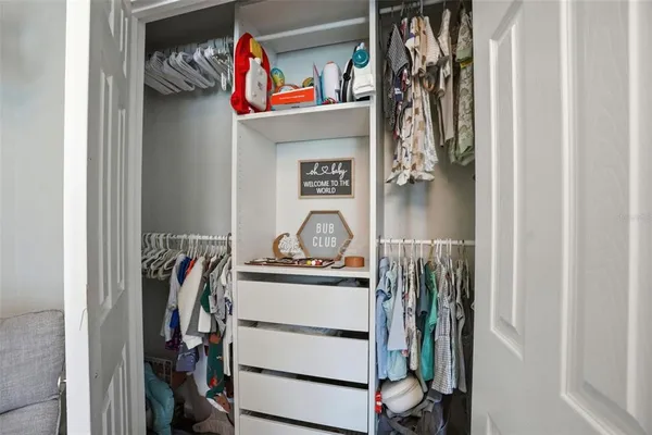 a balcony with furniture and a garden