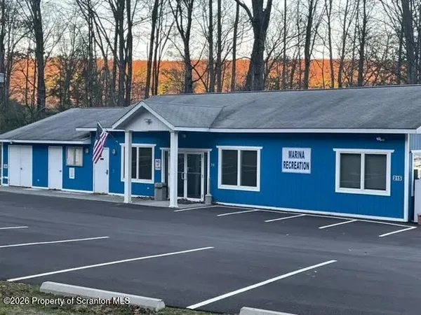 a front view of a house with a garage