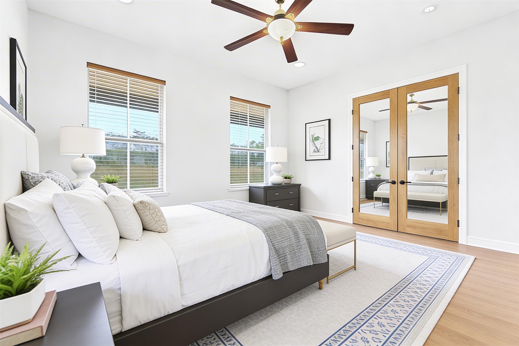 140 Winchester Road Bastrop, TX 78602 - Photo 26 of 35 Spare Bedroom 2 featuring french doors, light wood finished floors, ceiling fan, and recessed lighting