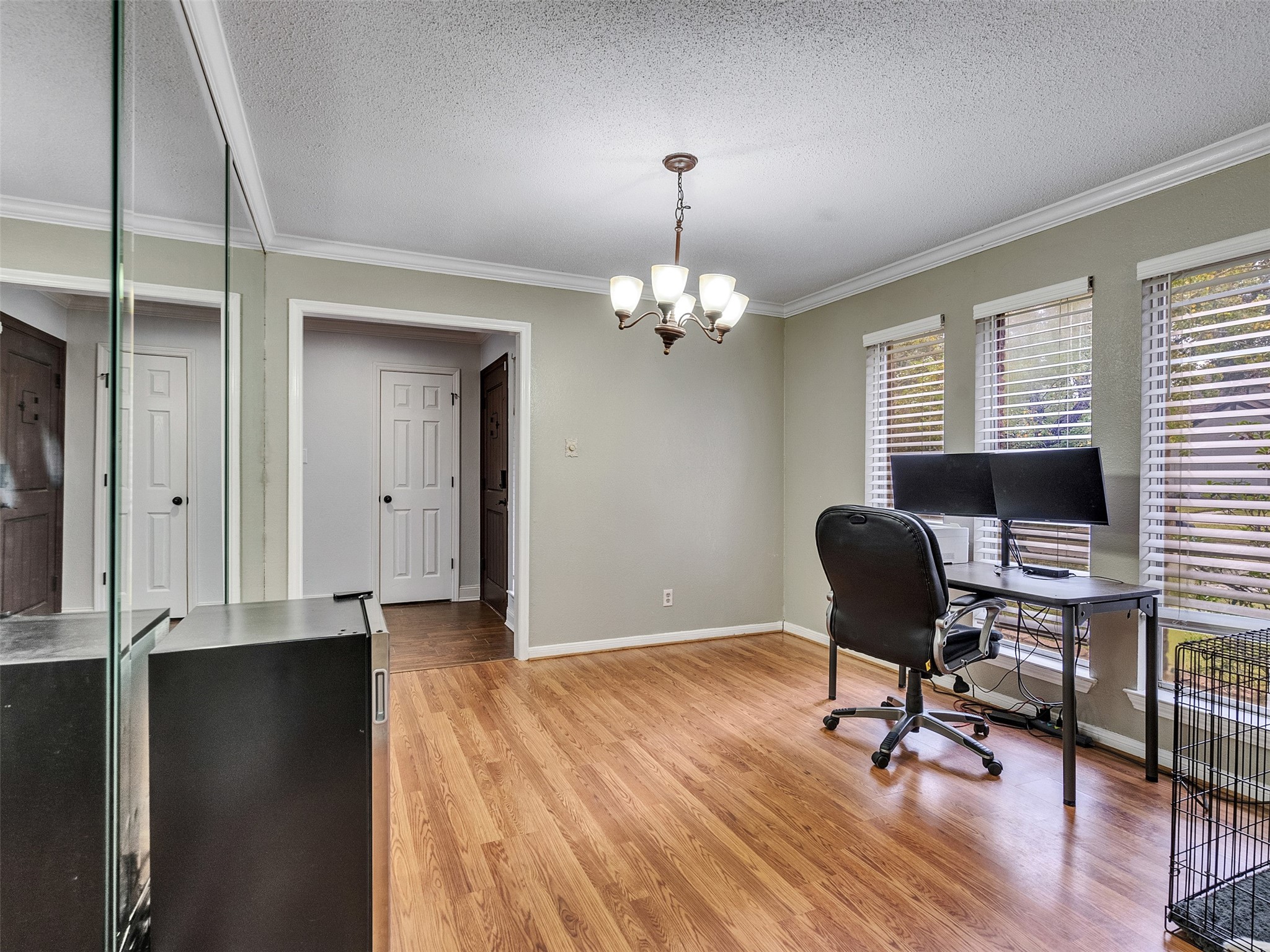 15703 Crestbrook Drive Houston, TX 77059 - Photo 19 of 50 Flex room or office of kitchen and living - foyer is located at the end.