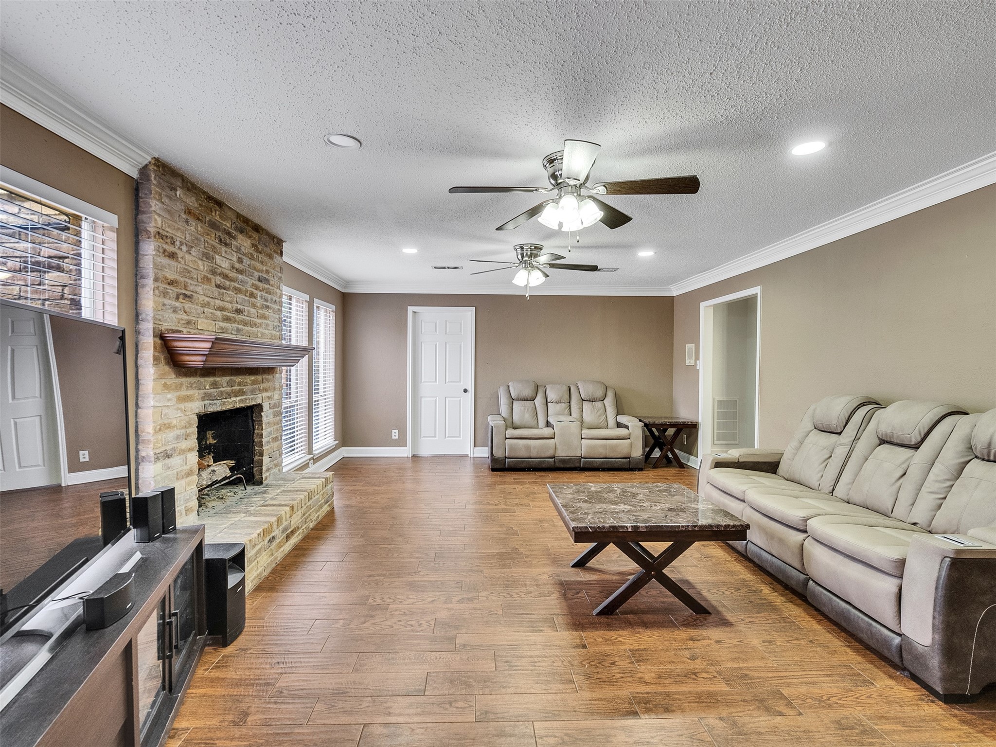 15703 Crestbrook Drive Houston, TX 77059 - Photo 22 of 50 Large living room with wood burning fire place.