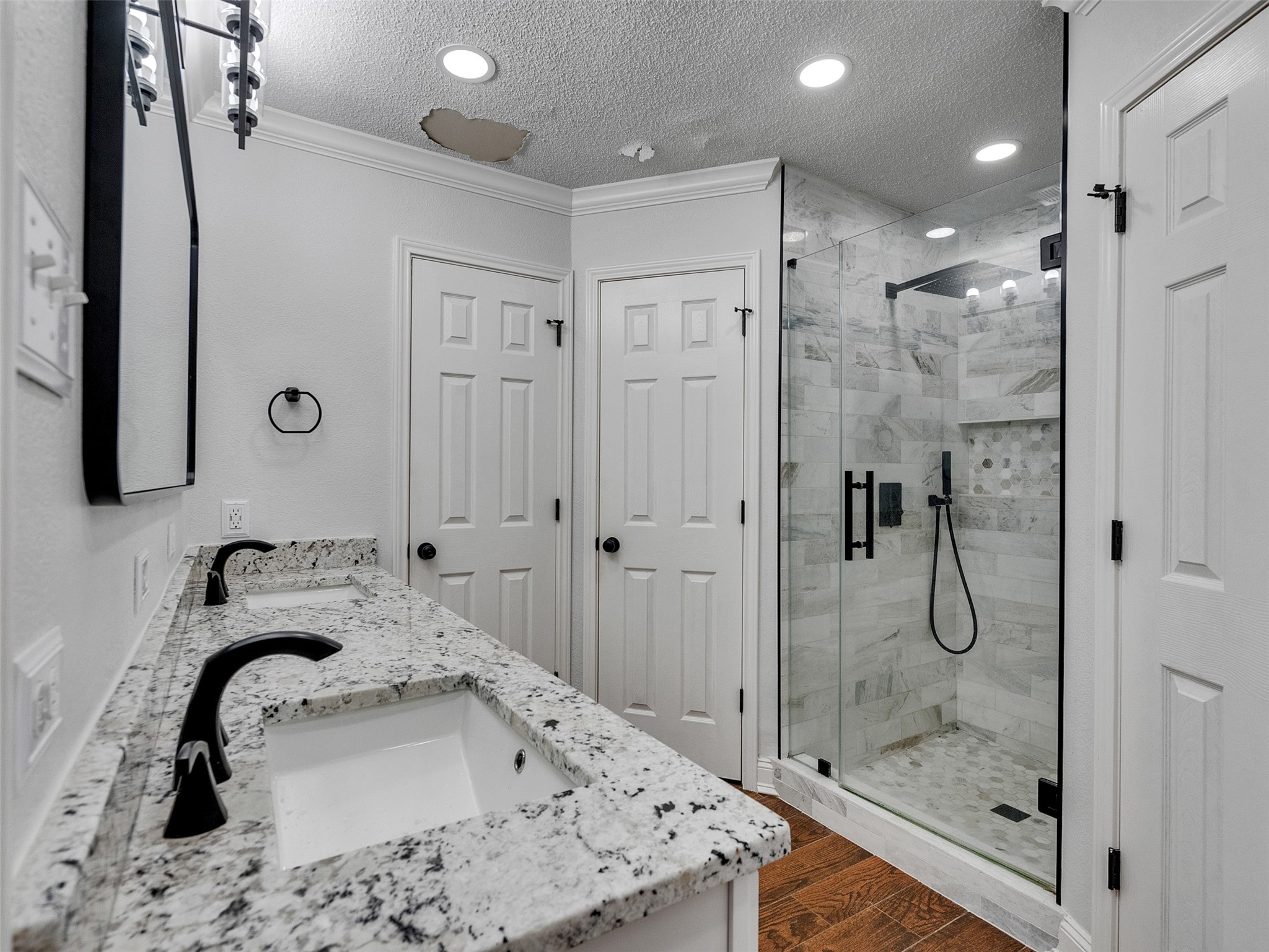 15703 Crestbrook Drive Houston, TX 77059 - Photo 28 of 50 Updated primary bathroom with granite and double sinks & his/hers closets