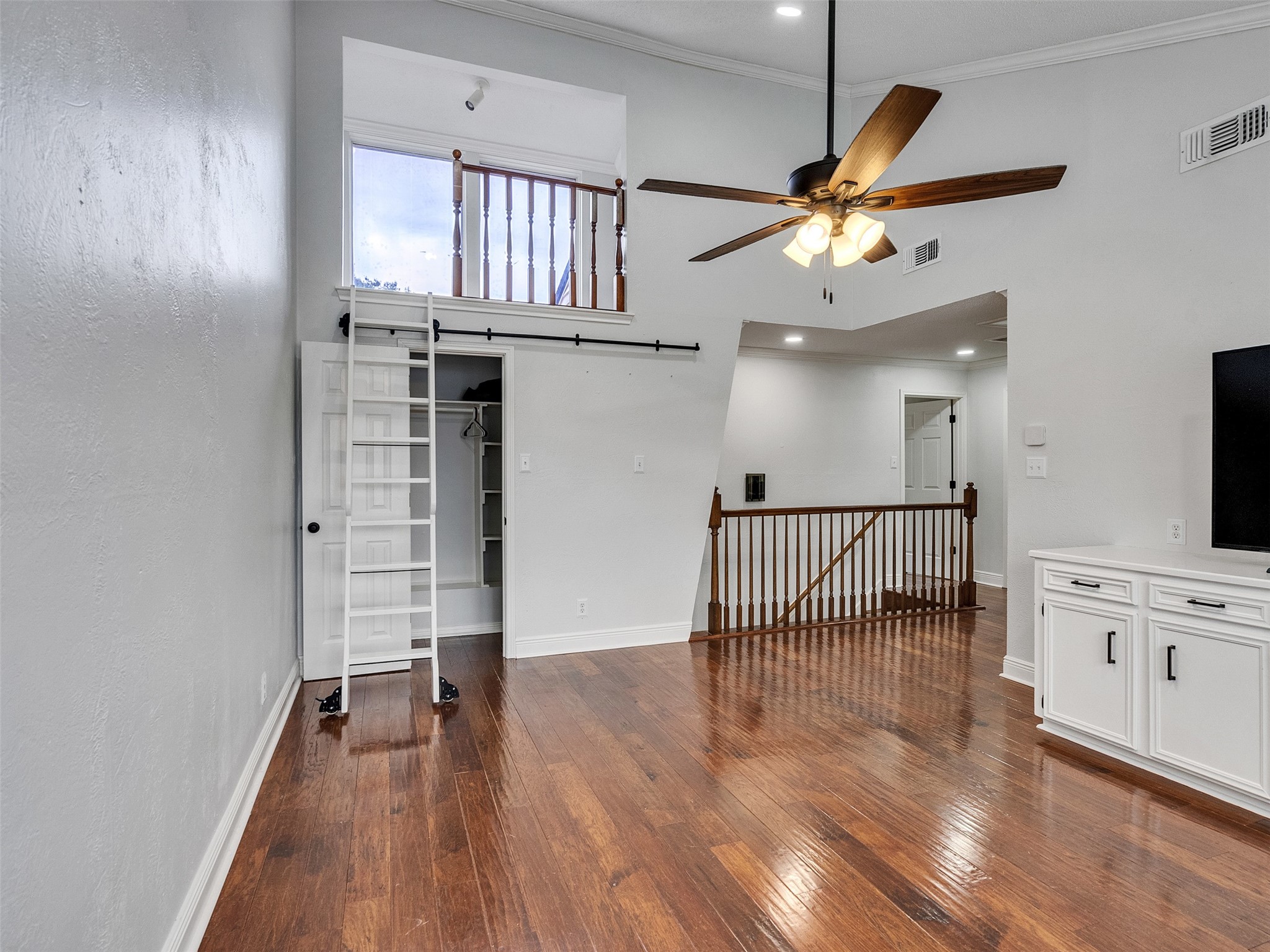 15703 Crestbrook Drive Houston, TX 77059 - Photo 30 of 50 Game room with a ladder to small loft. Closet has built ins and extra storage