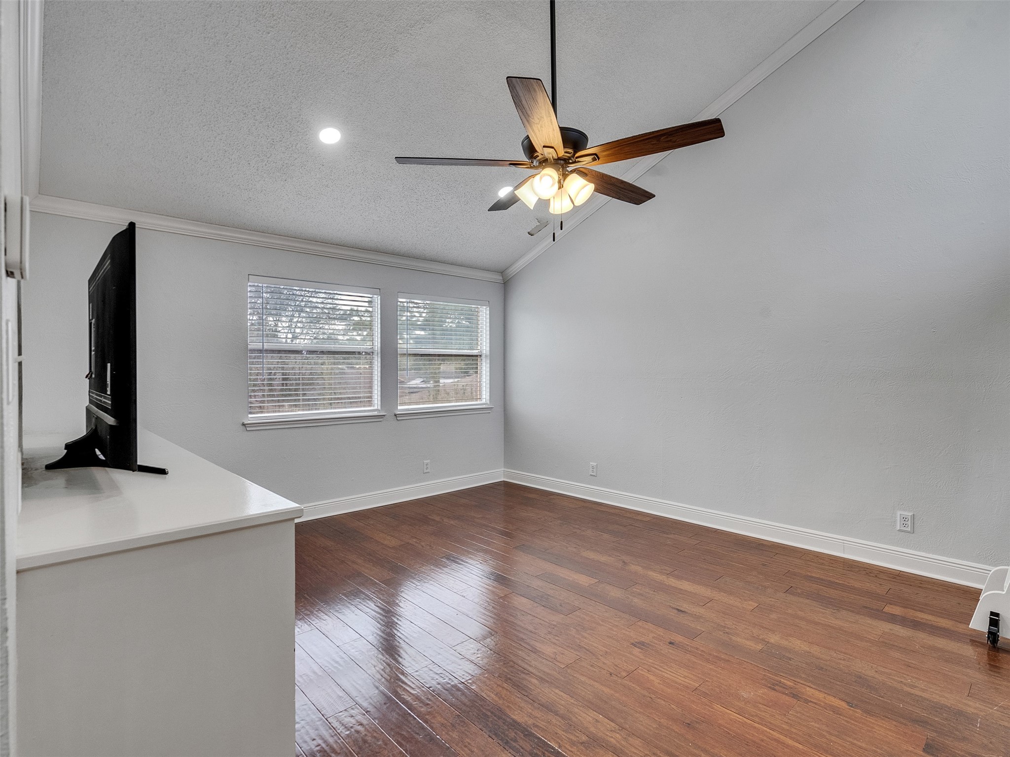 15703 Crestbrook Drive Houston, TX 77059 - Photo 31 of 50 Looking from stairs into game room windows and built ins! Perfect for movie night!