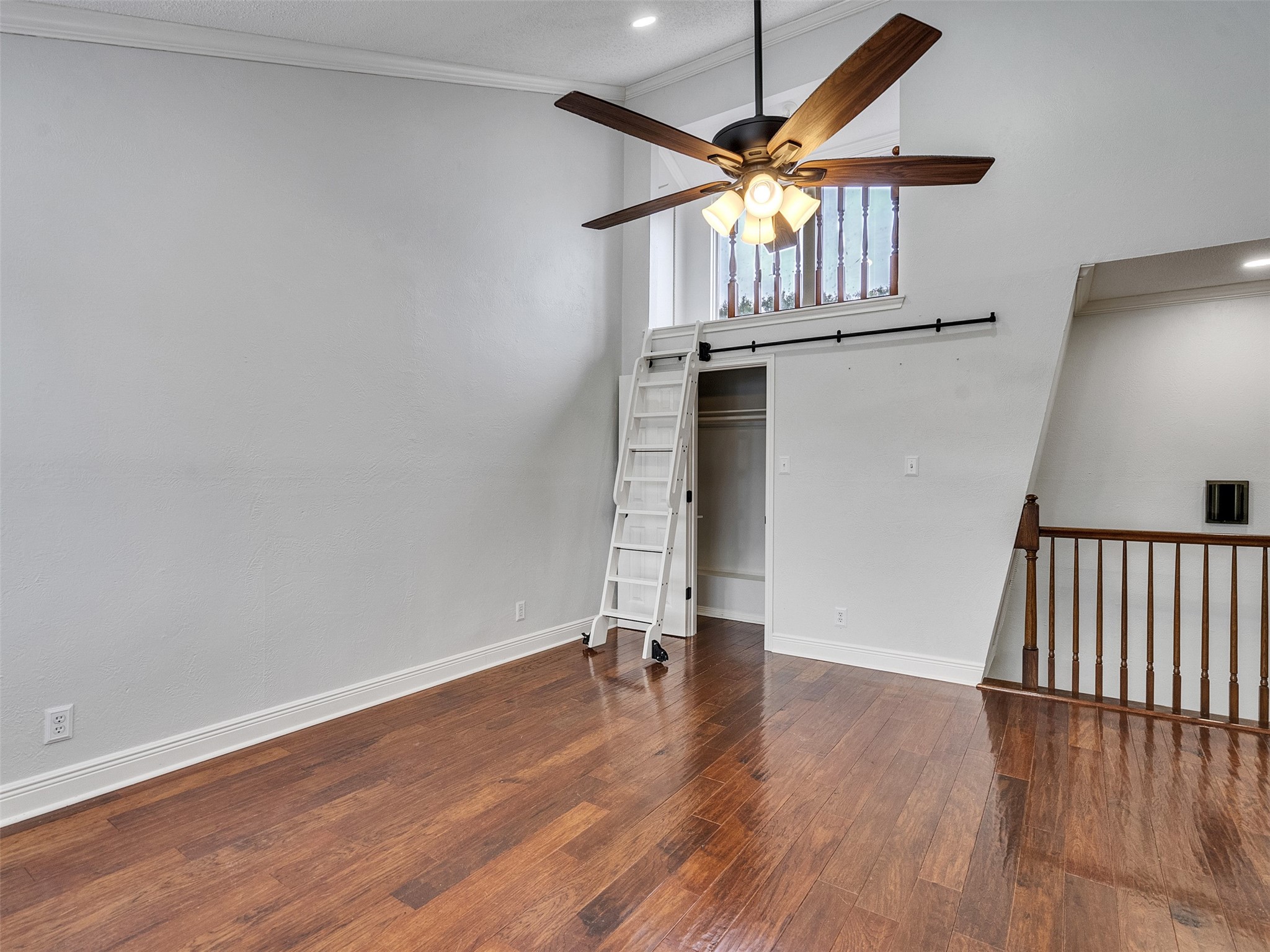 15703 Crestbrook Drive Houston, TX 77059 - Photo 32 of 50 Looking from windows back to stairs with view of loft!