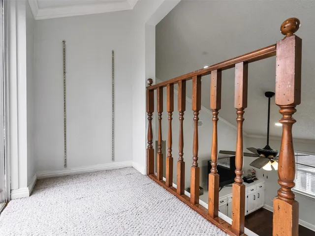 a view of a livingroom with furniture and hardwood floor