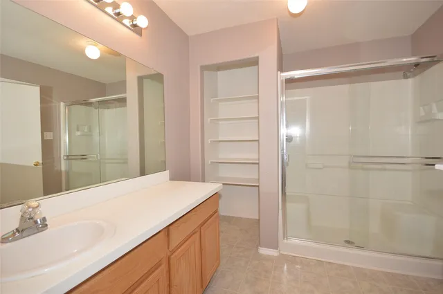 a bathroom with a bathtub and a sink