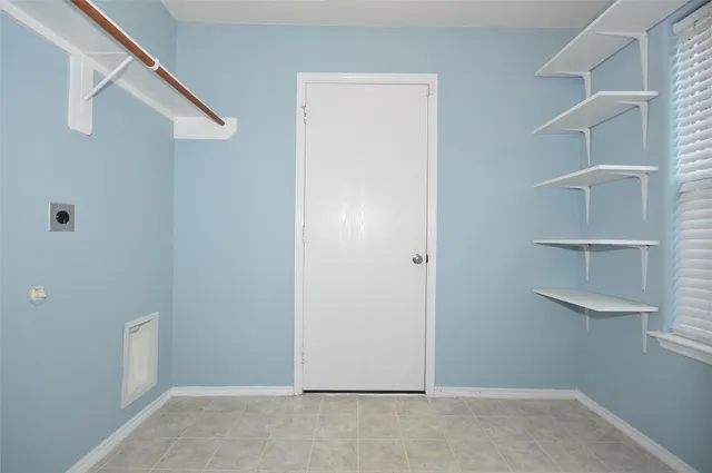 a view of an empty walk in closet