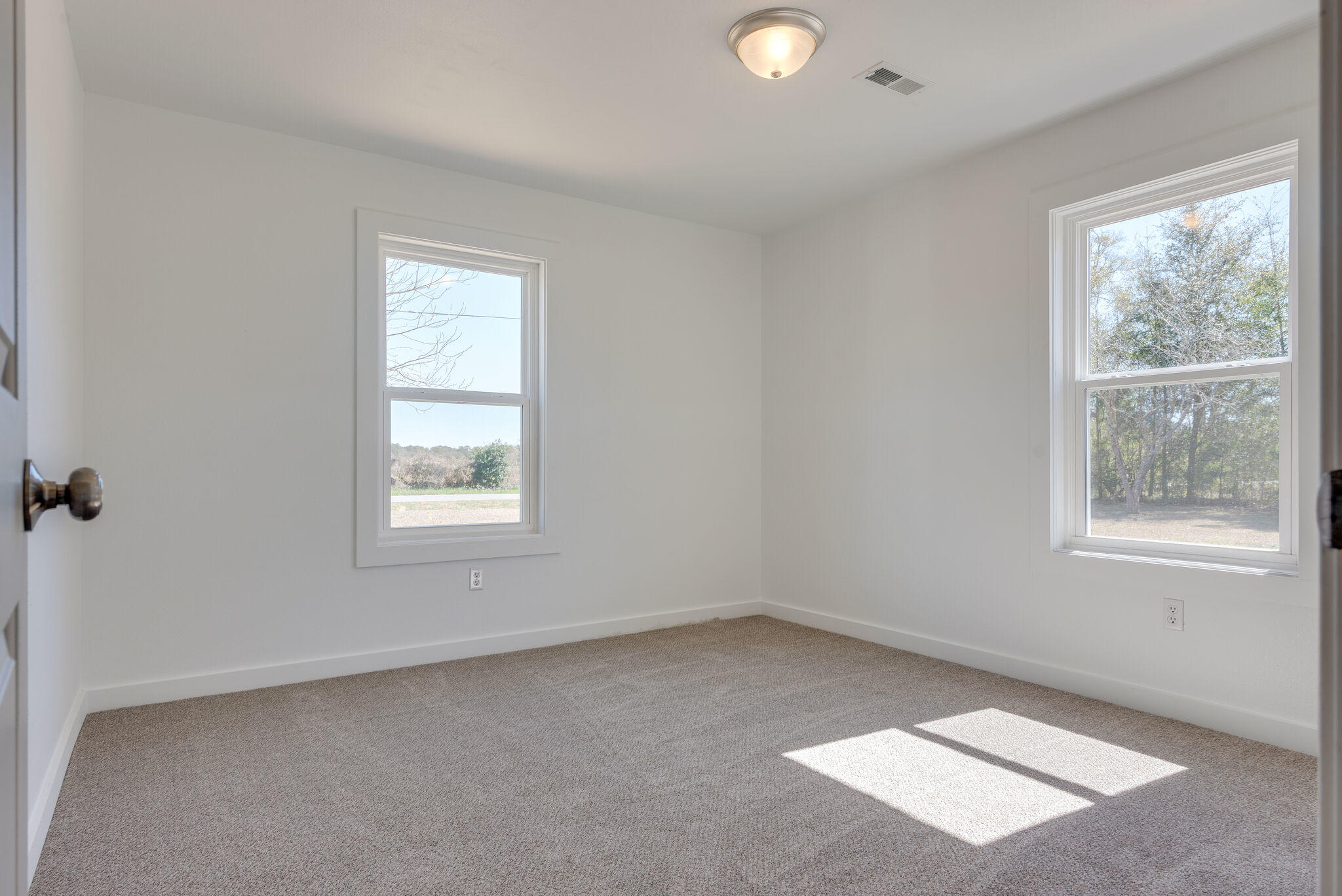 5238 Griffith Mill Road Baker, FL 32531 - Photo 22 of 34 an empty room with a window