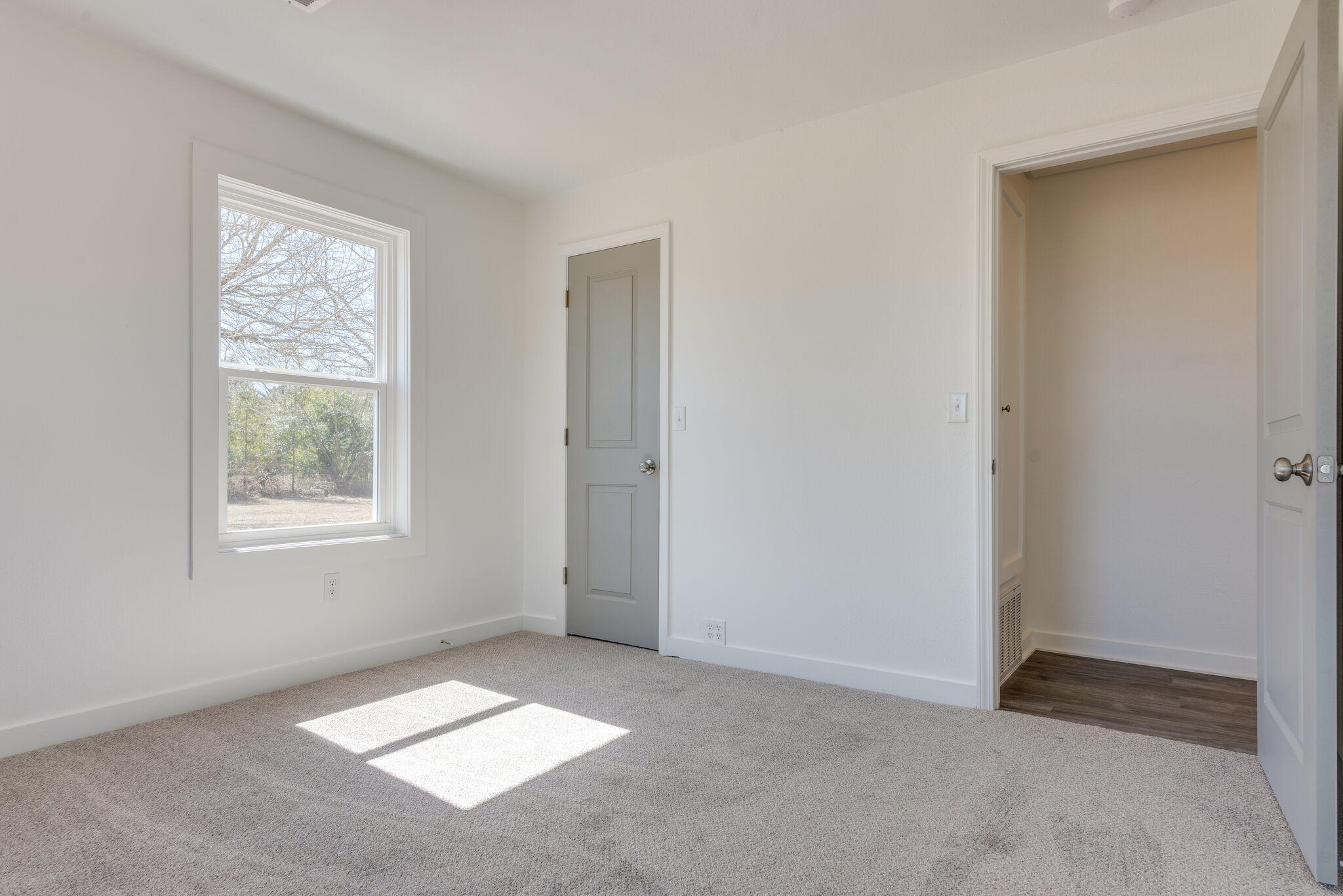5238 Griffith Mill Road Baker, FL 32531 - Photo 23 of 34 a view of an empty room with windows