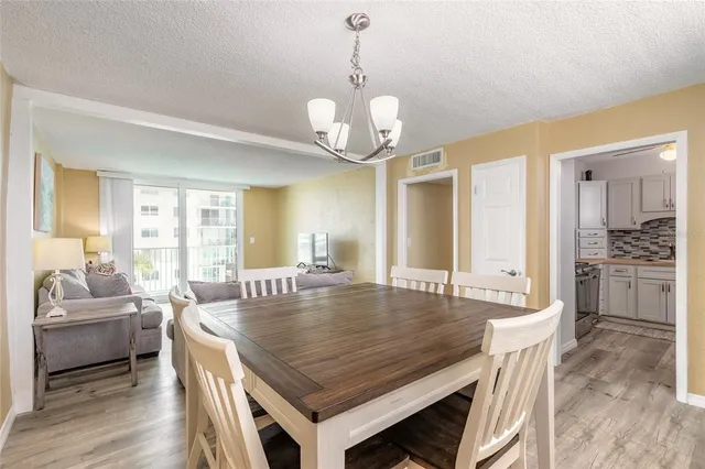 a view of a kitchen with washer and dryer