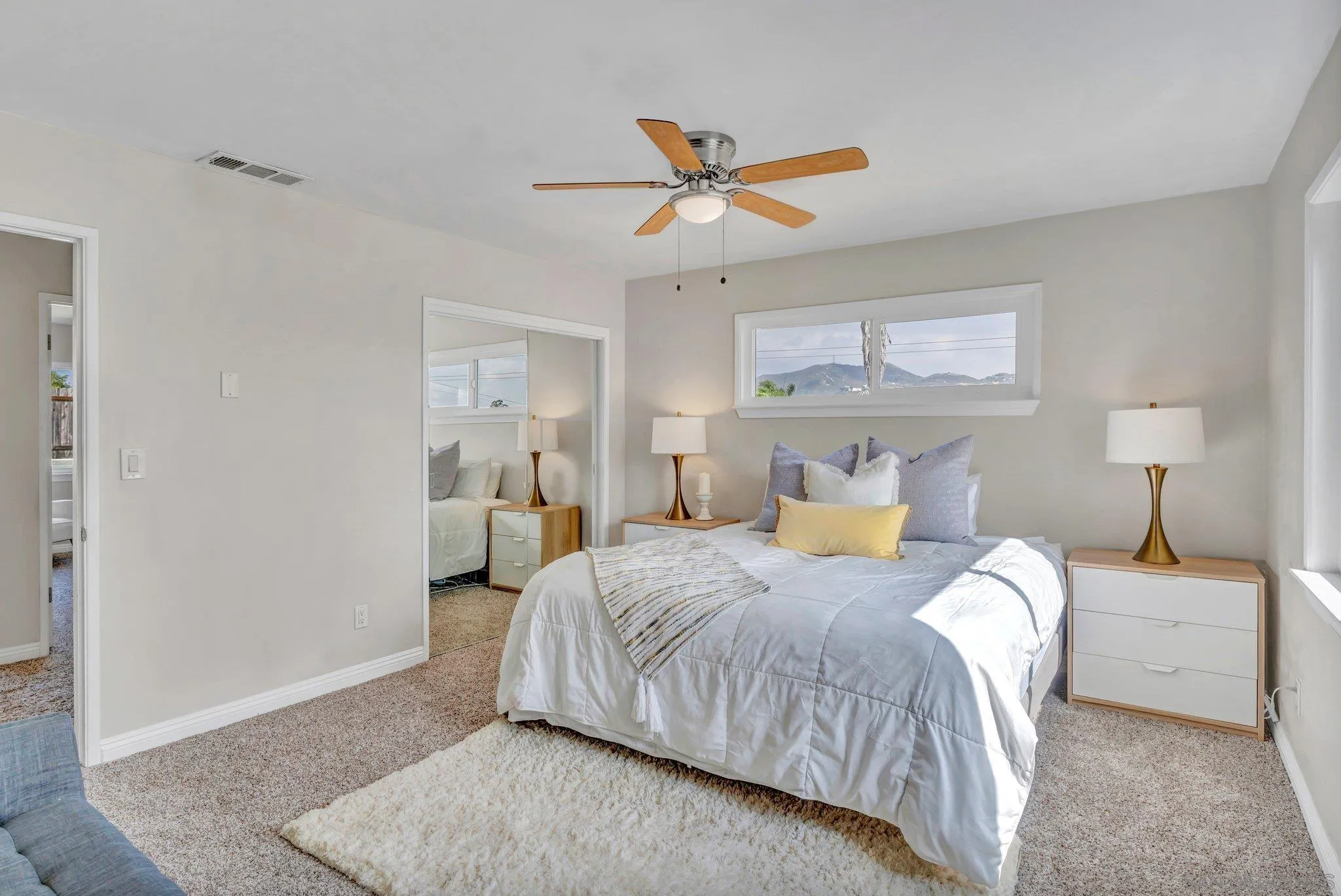 1217 Memory Lane Vista, CA 92084 - Photo 13 of 72 a bedroom with a bed and ceiling fan
