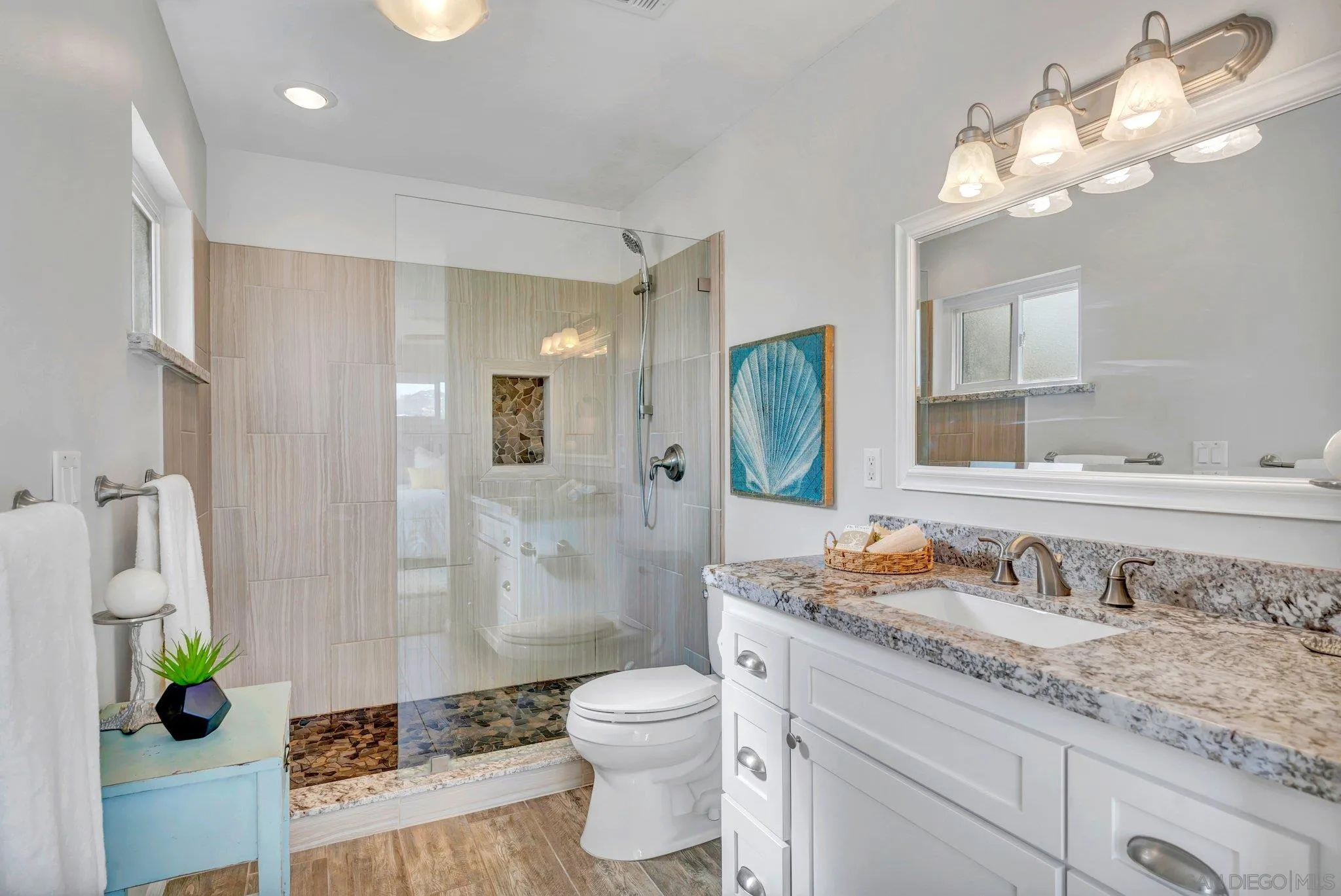 1217 Memory Lane Vista, CA 92084 - Photo 14 of 72 a bathroom with a granite countertop sink toilet and shower