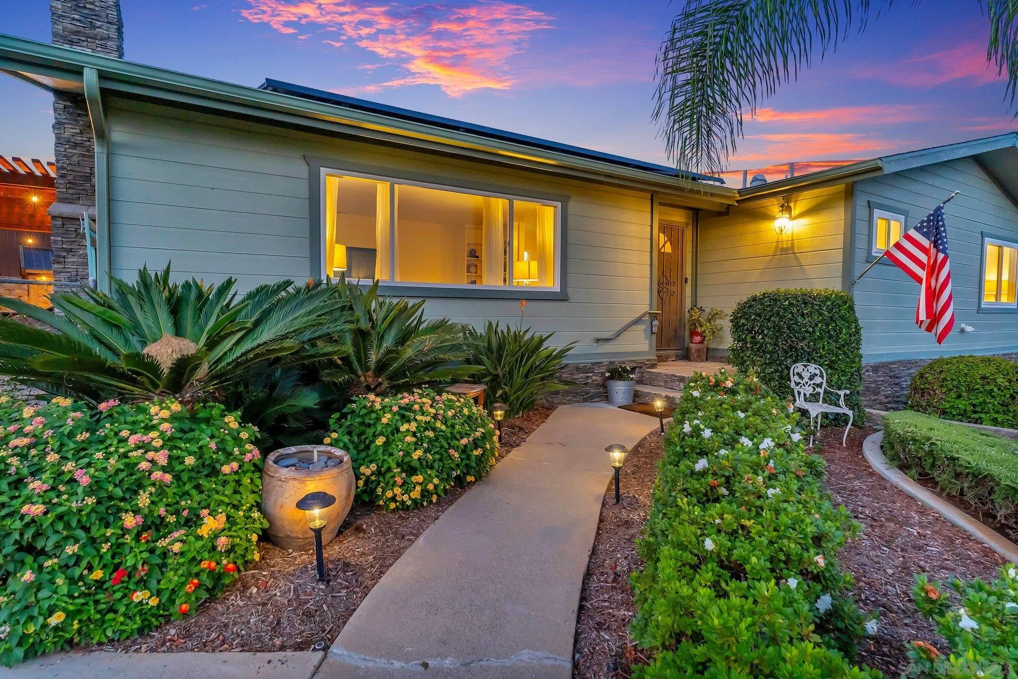 1217 Memory Lane Vista, CA 92084 - Photo 2 of 72 a front view of a house with a yard