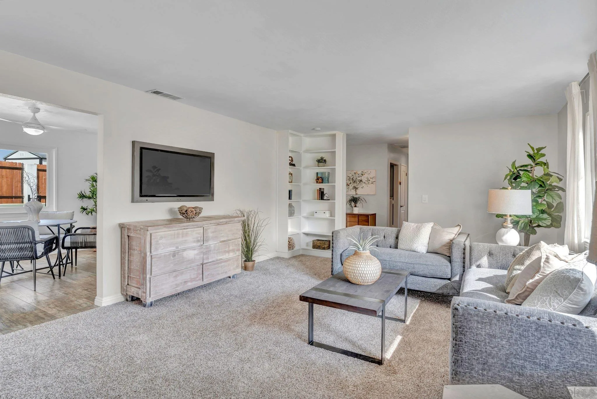 1217 Memory Lane Vista, CA 92084 - Photo 5 of 72 a living room with furniture and a flat screen tv