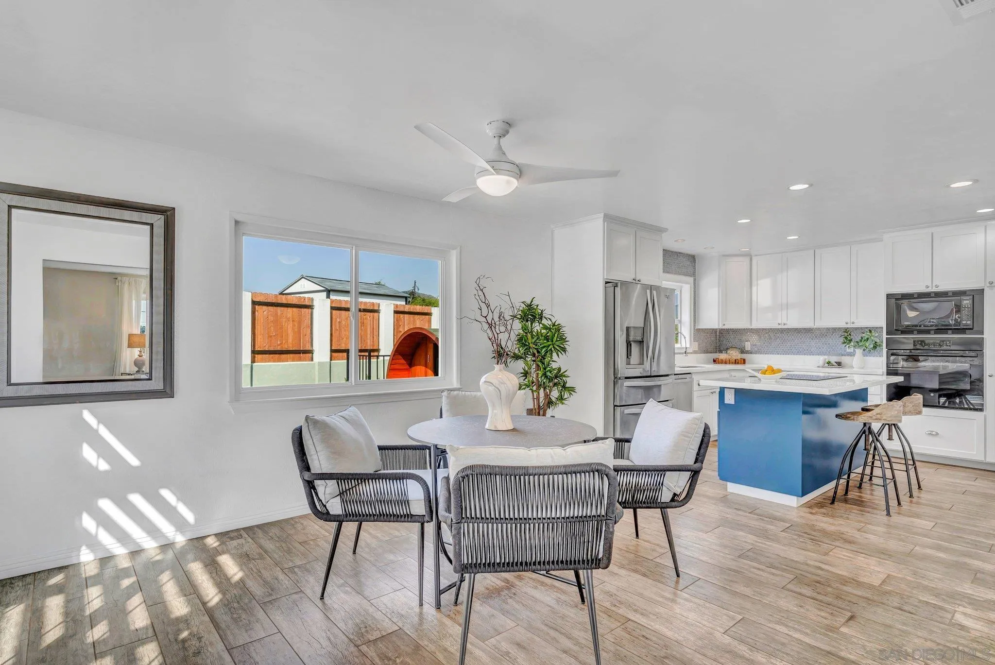1217 Memory Lane Vista, CA 92084 - Photo 8 of 72 a dining room with furniture and window