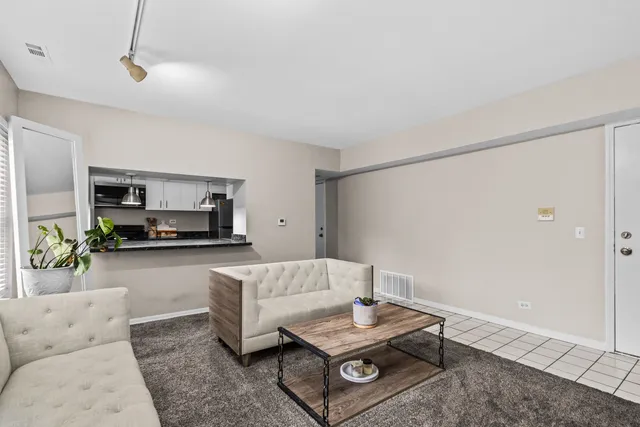 a living room with furniture and a couch