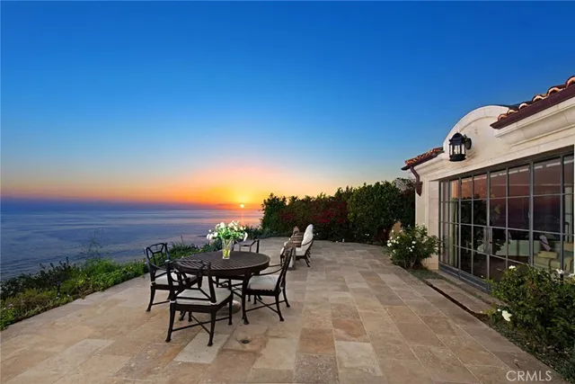 a view of a tables and chairs in patio