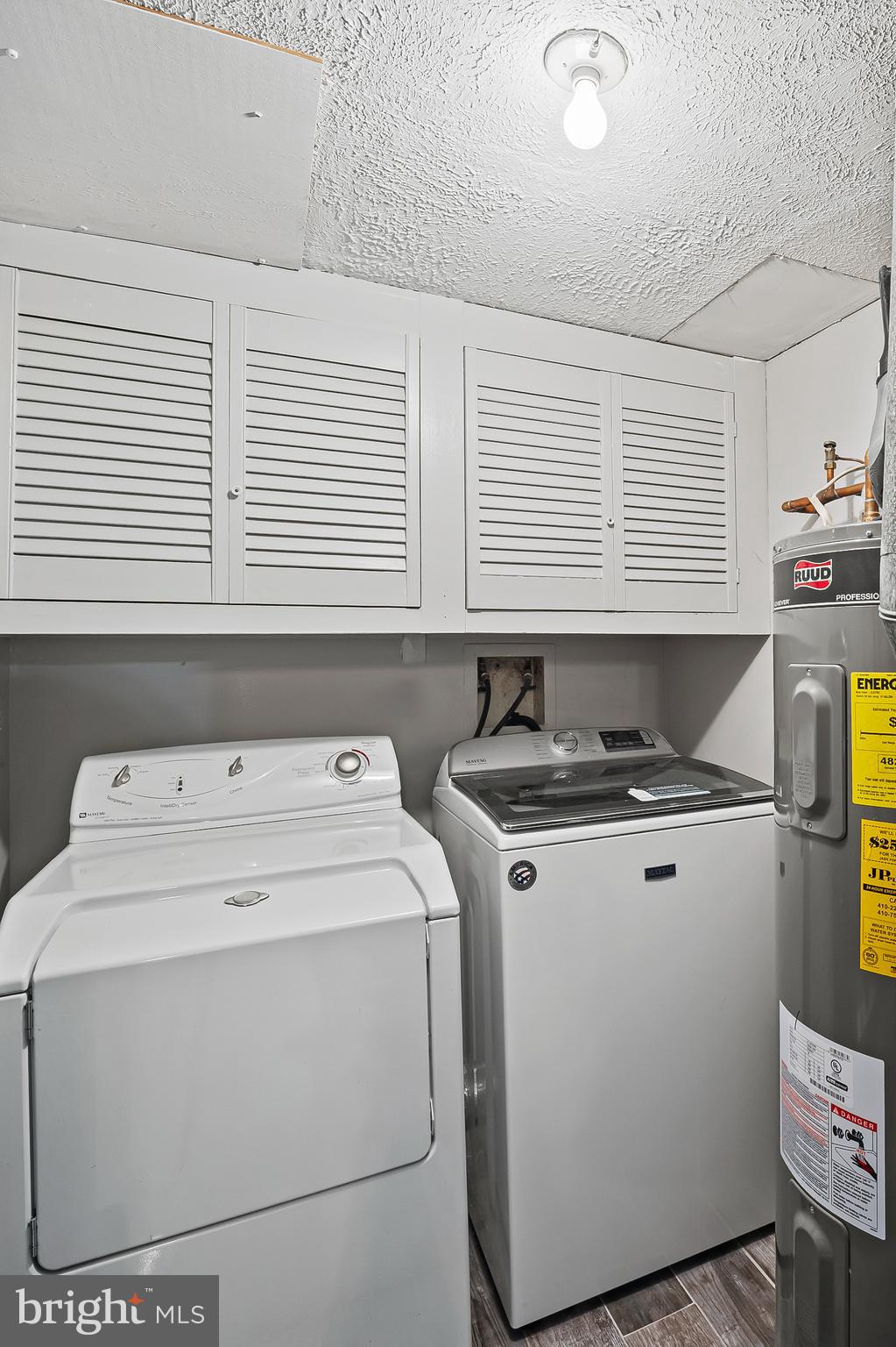 2472 Wintergreen Way Gambrills, MD 21054 - Photo 20 of 55 a utility room with dryer and washer
