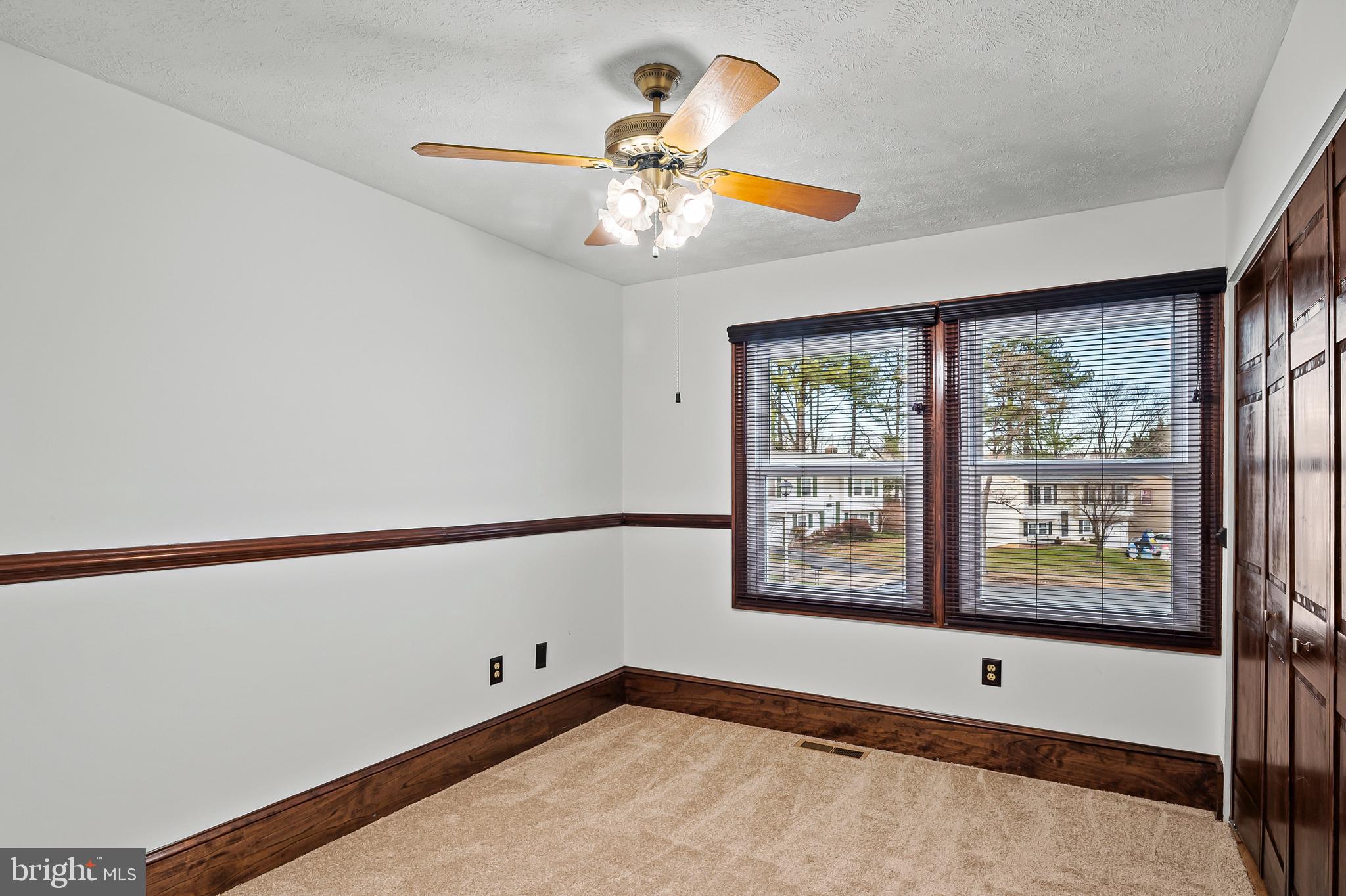 2472 Wintergreen Way Gambrills, MD 21054 - Photo 25 of 55 a view of an empty room with a window